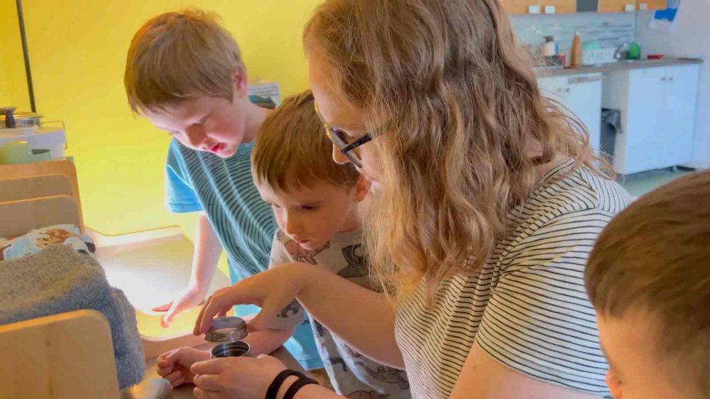 A Montessori guides gives a NatureTot Sytem presentation